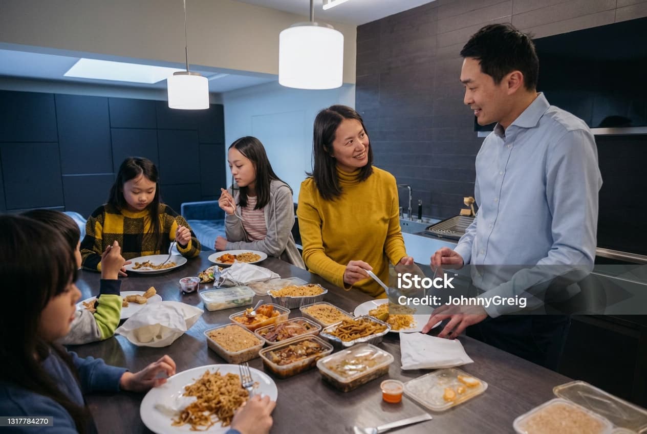 A family preparing visa application paperwork.