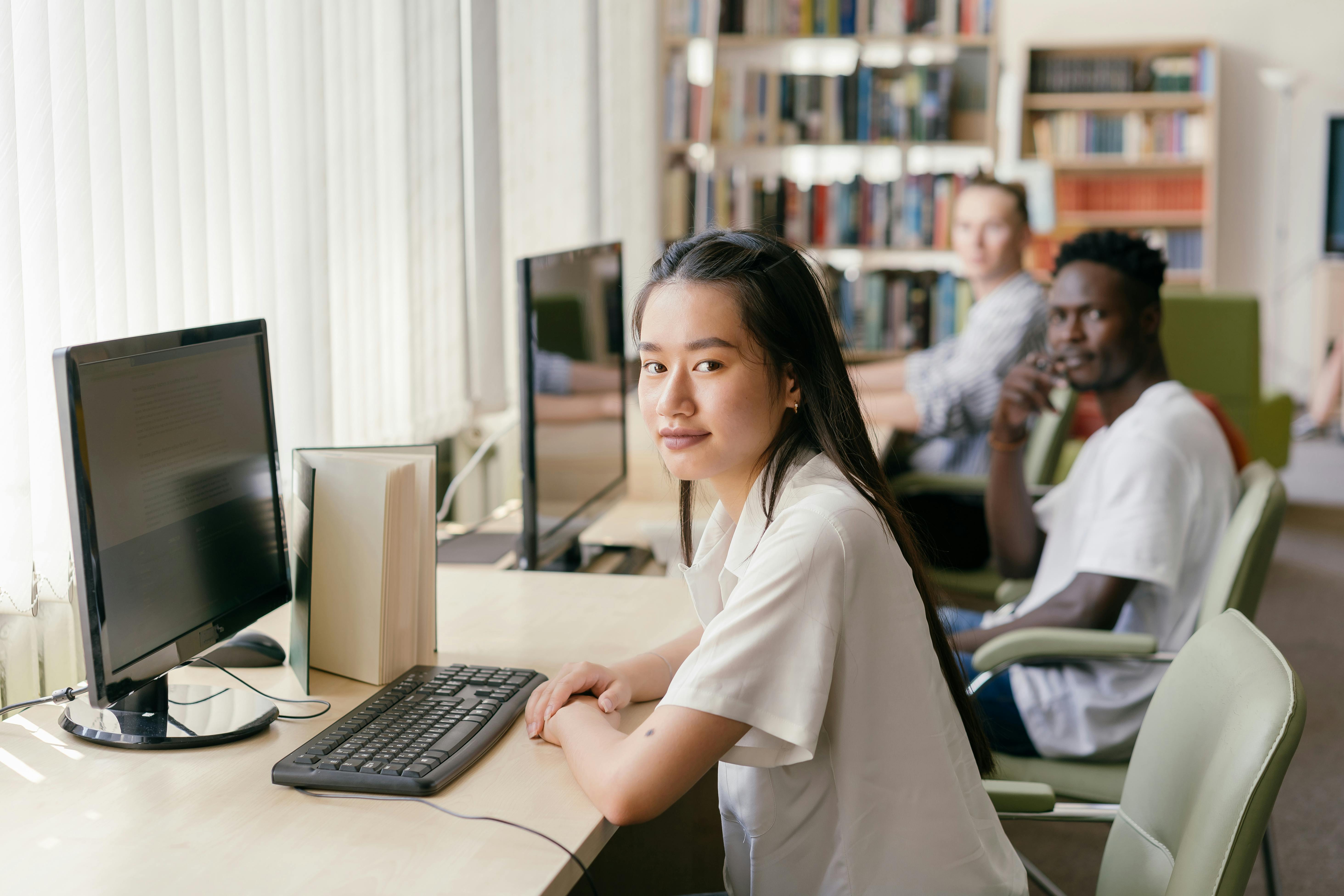 A study desk set up for comparing Canadian universities.